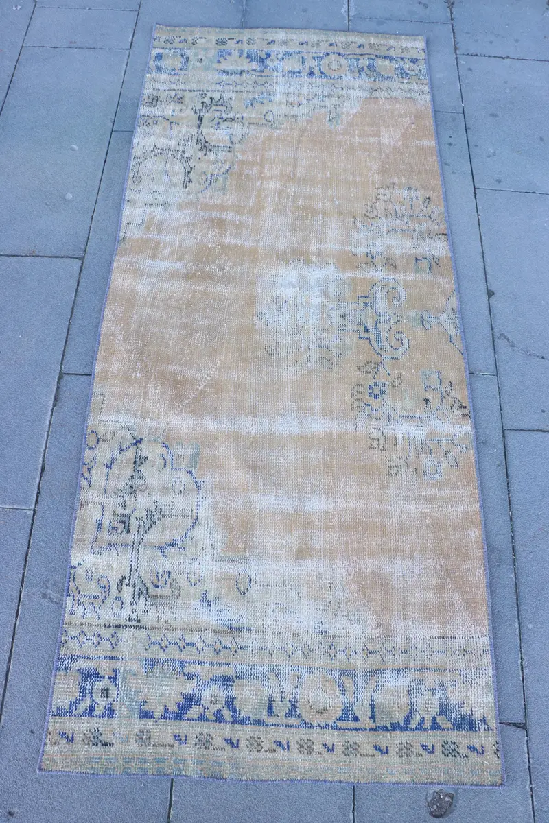 Alfombra marrón del suroeste, 2,5 x 6,1 pies con detalles en azul