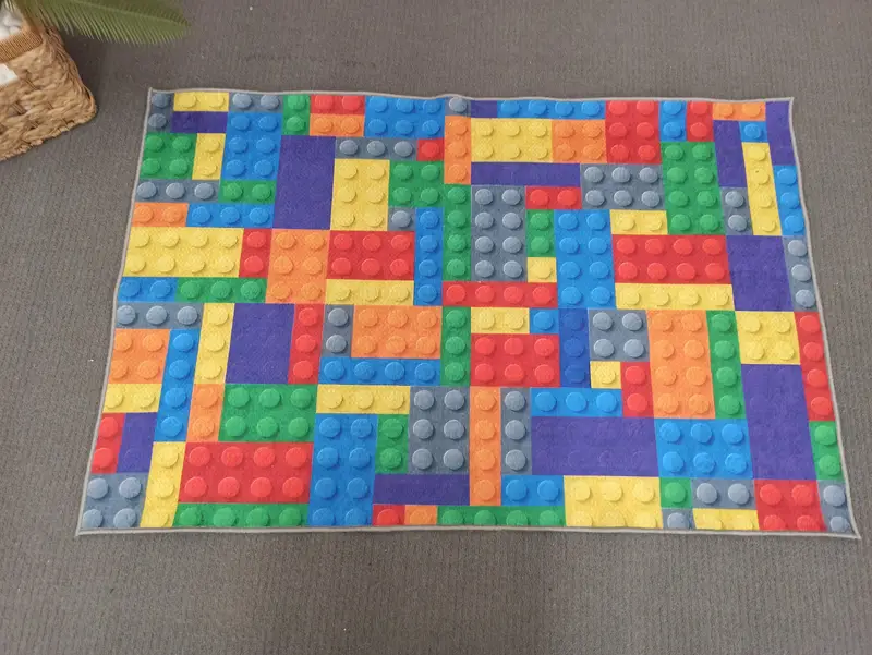 トレンディなプリントラグ: 遊び心のあるスペースのためのカラフルなビルディングブロック