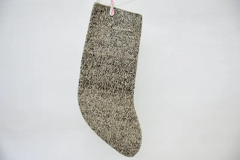 ベージュのクリスマス ストッキング、茶色の装飾品、お祝いの休日の装飾