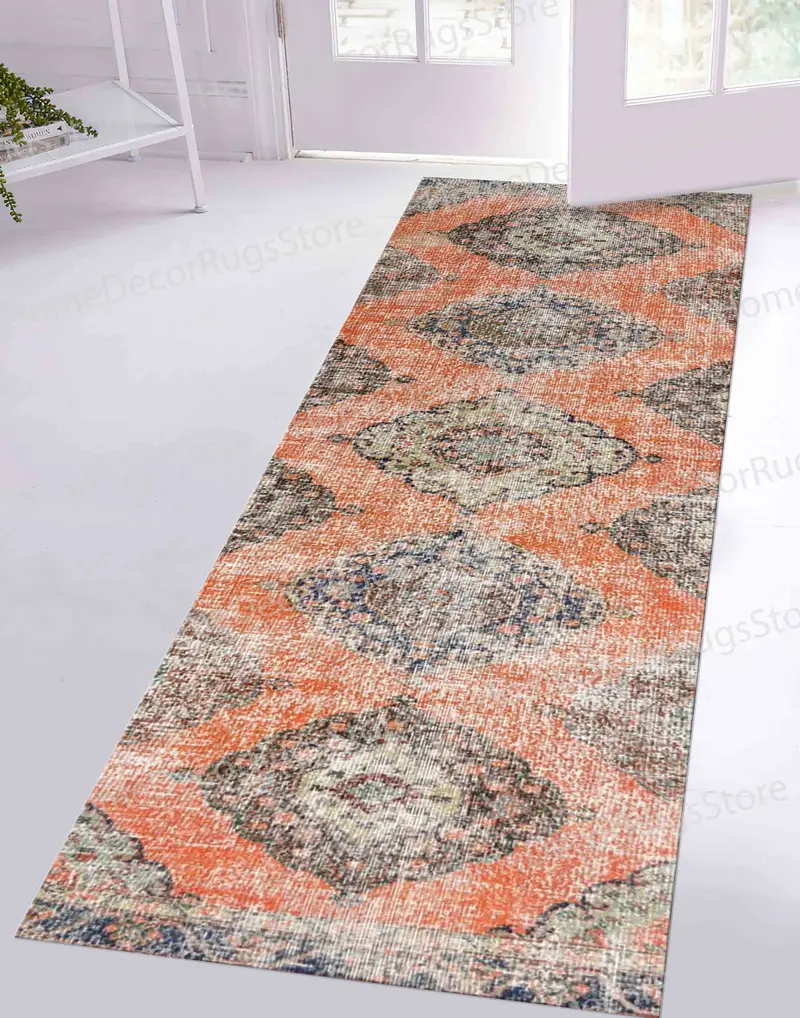 Orangefarbener aztekischer Navajo-bedruckter Teppich: Lebhaftes Dekor im Südwesten