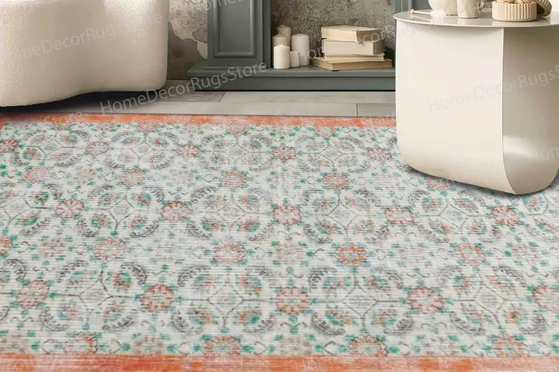 色あせたブルーの花柄プリントラグ、落ち着いた色調、モダンなデザイン