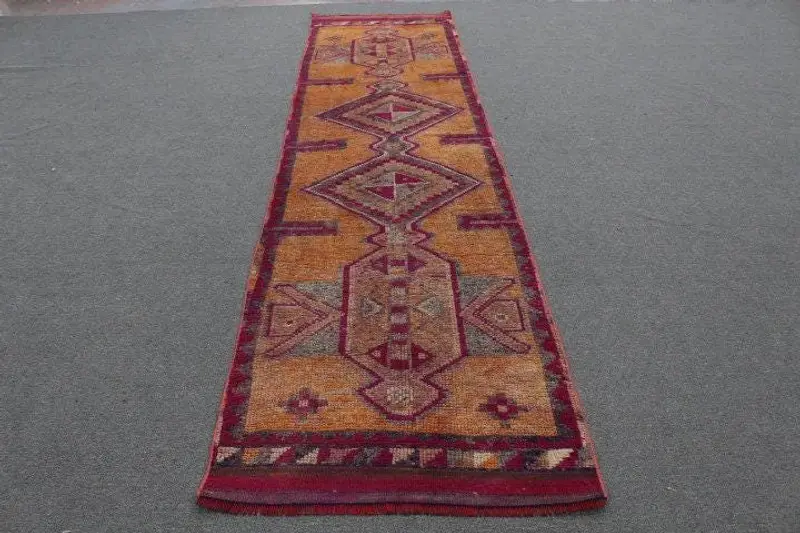 Vibrante alfombra marroquí, 9 x 3,5 m, naranja y rosa