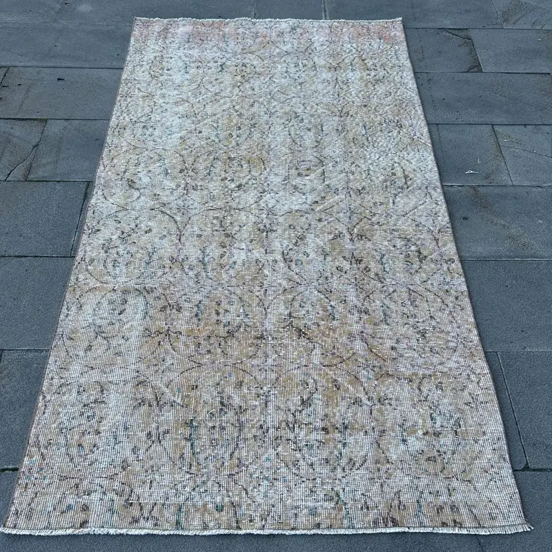 Alfombra Elegante Beige 1,1x1,8m con Detalles en Naranja