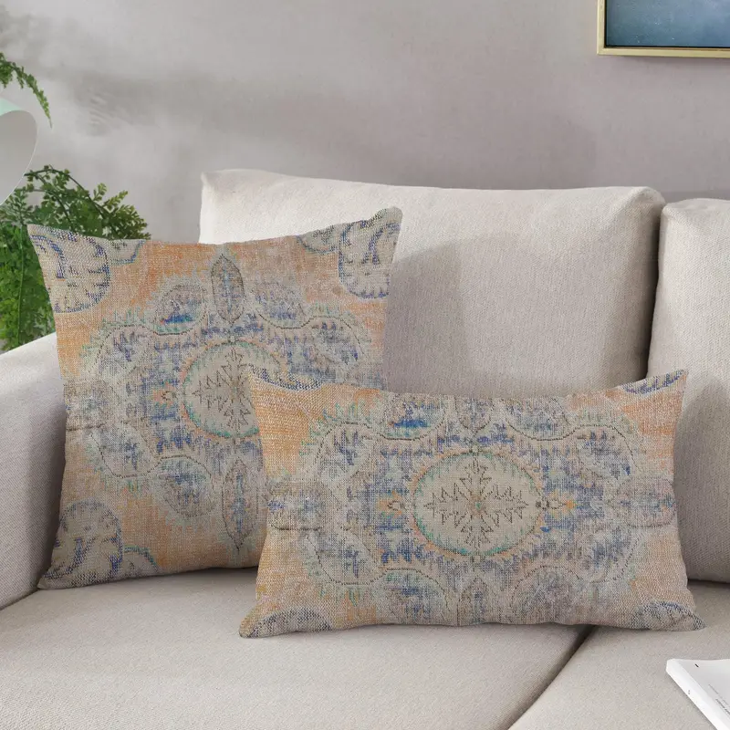 Blaues und orangefarbenes Kissen mit Ethno-Bauernhaus-Aufdruck – Bio-Komfort