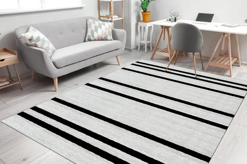 エレガントなプリントラグ: ホワイト&ブラックのヴィンテージデザイン