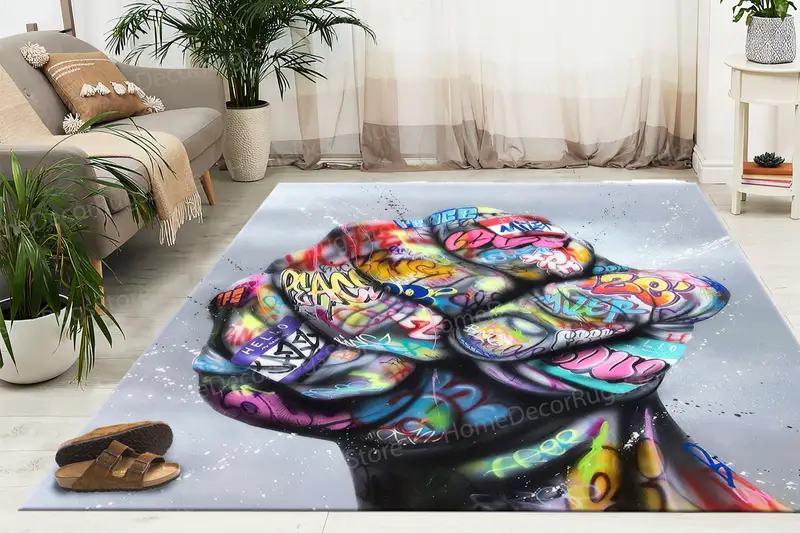 インスピレーションを与えるグラフィティアートプリントラグ: カラフルな拳デザイン