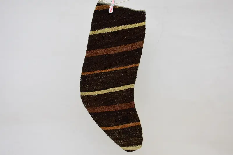 茶色とオレンジのクリスマスオーナメントストッキング、お祝いの休日の装飾