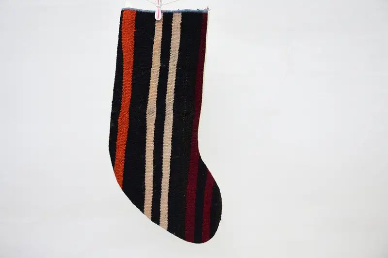 茶色とオレンジのクリスマスオーナメントストッキング、お祝いの休日の装飾