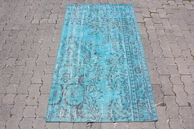 Blauer Perserteppich mit schwarzen Akzenten, 90 x 150 cm
