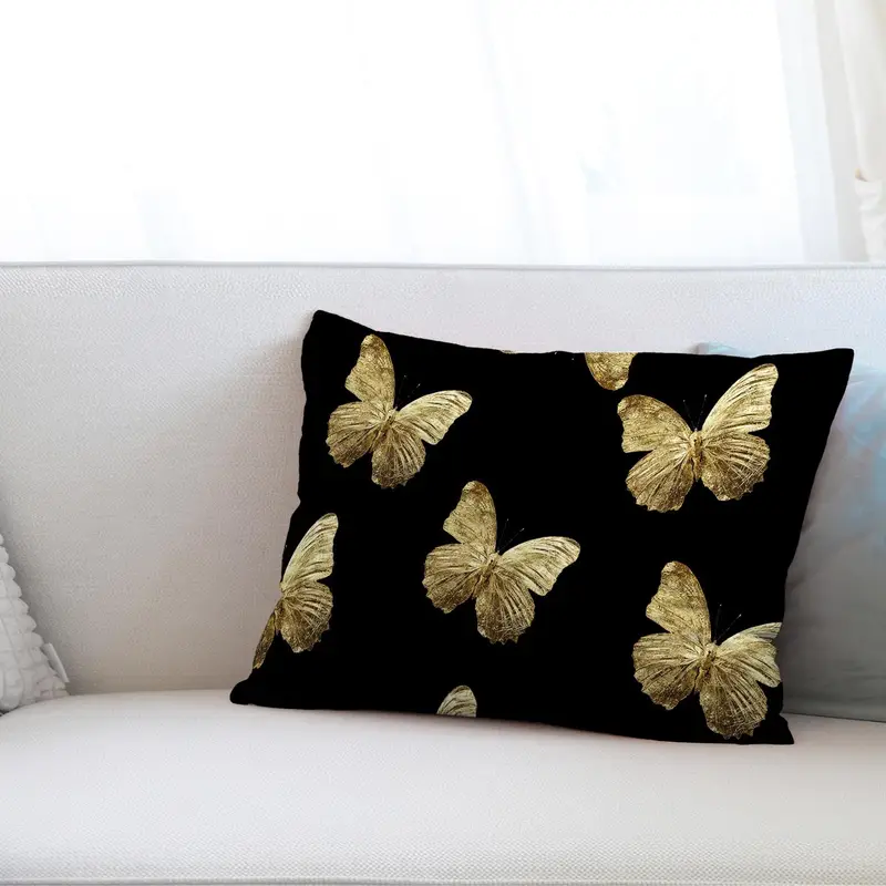 Bedrucktes Kissen mit goldenem Schmetterling: Luxuriöser, moderner Wohndekor-Akzent