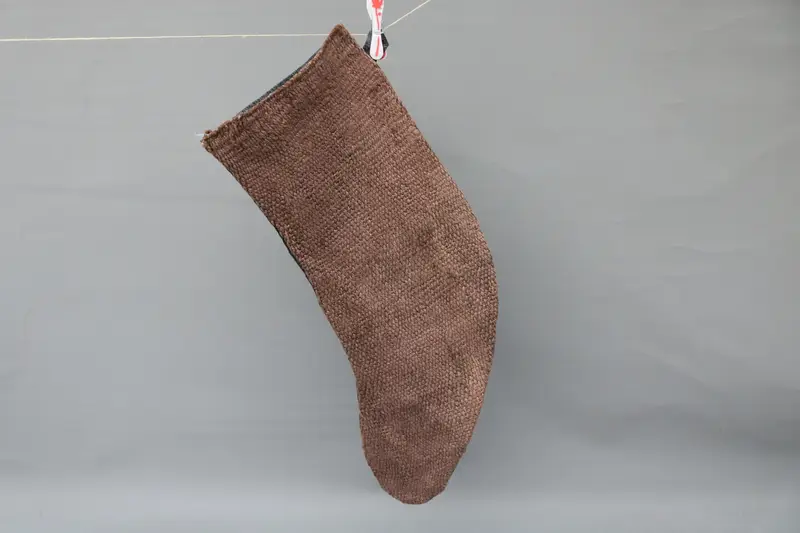 Brown Christmas Stocking with Black Ornaments, Festive Holiday Decor