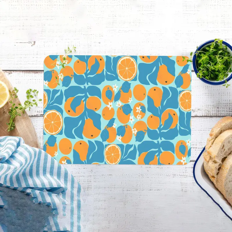 Abstract Orange Glass Cutting Board with Blue Leaf Design