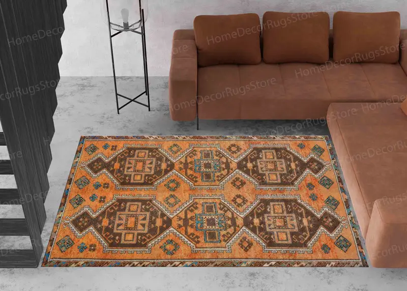 エレガントなオレンジとブラウンのアステカ ナバホ キリム プリント ラグ