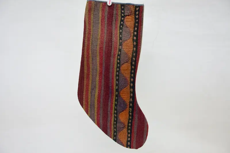 Roter und orangefarbener Weihnachtsstrumpf, festlicher Weihnachtsstrumpf