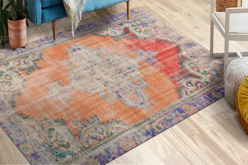 オレンジメダリオンプリントラグ：エスニックパターン、落ち着いた色調、豪華な快適さ