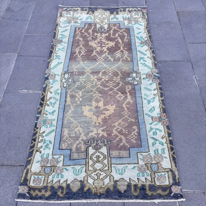 Alfombra Ikat morada, 3,1x6,2 pies con detalles en verde