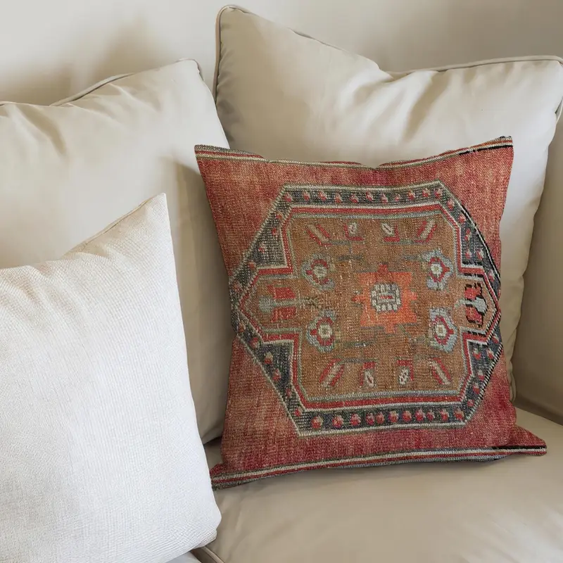 Almohada estampada de algodón verde y marrón: acento elegante para la decoración del hogar