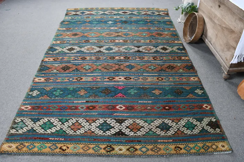 手作りのブルーサウスウェスタンラグ、0.5x0.8フィート、オレンジのアクセント付き