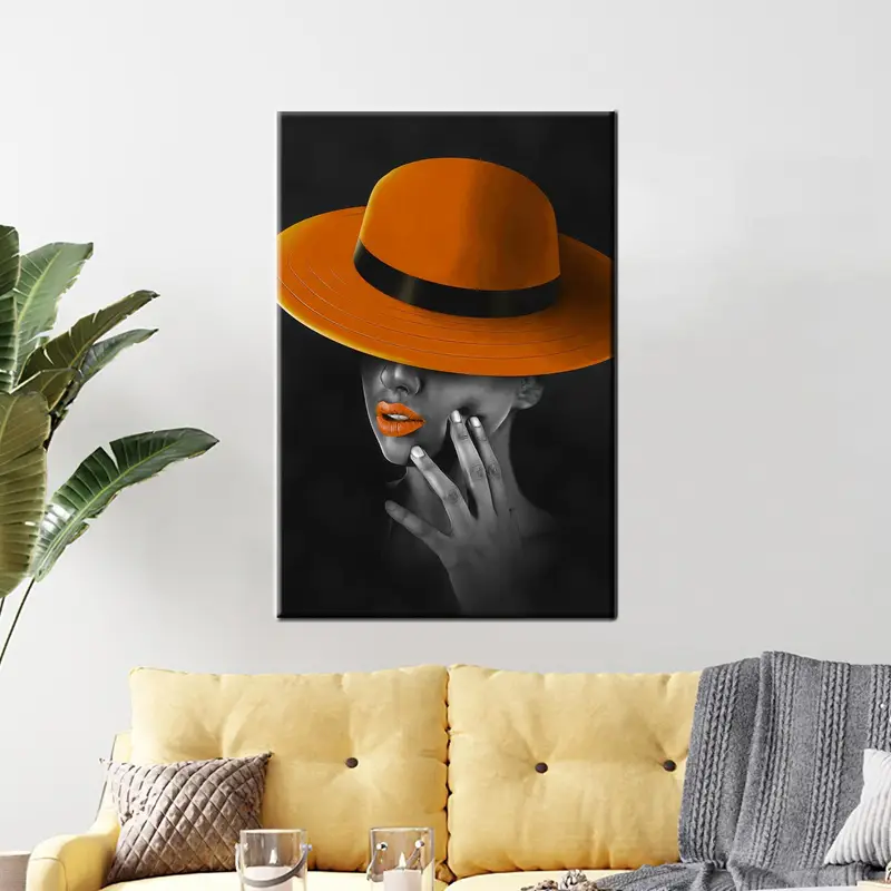 モダンで豪華なキャンバス: 鮮やかな黒とオレンジのアフリカの女性