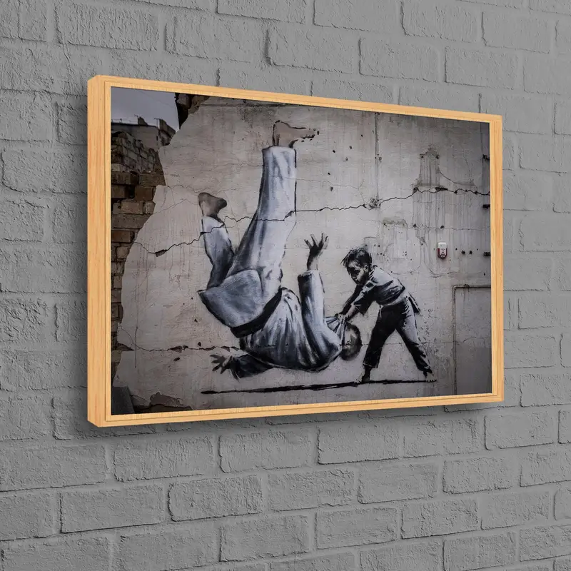Cuadro: El arte bélico de Banksy se une a la elegancia del graffiti de los judokas