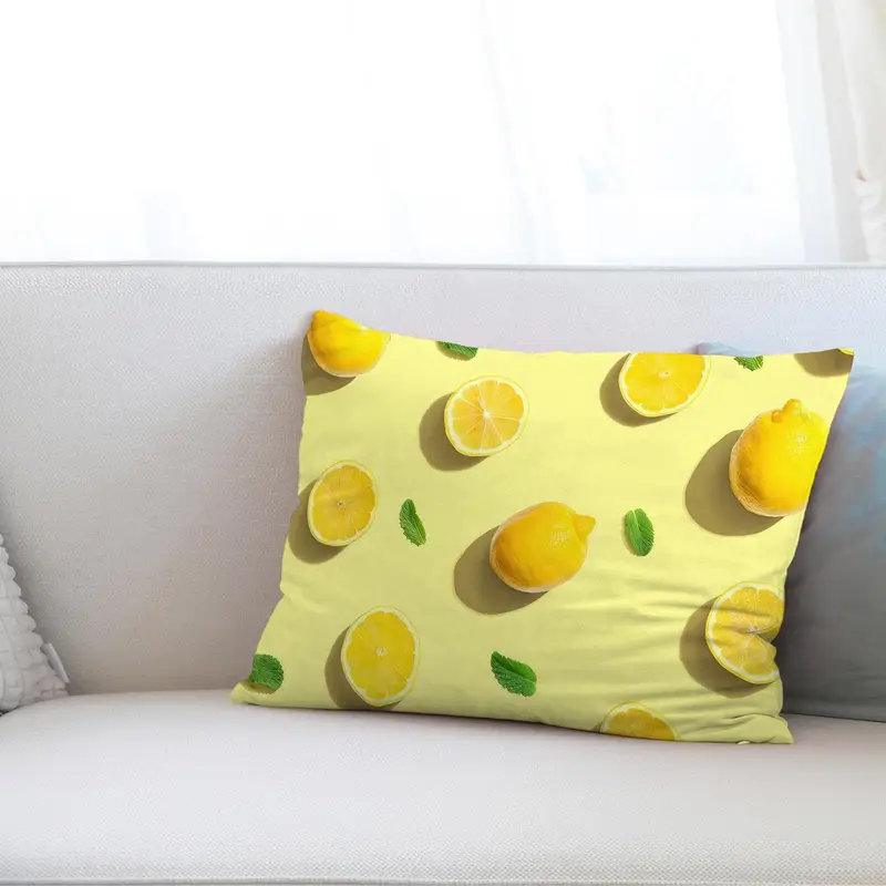 Kissen mit gelbem Fruchtdruck: Lebhaftes Zitrus-Design für die Inneneinrichtung